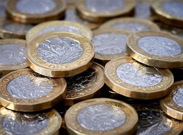 A pile of British one-pound coins